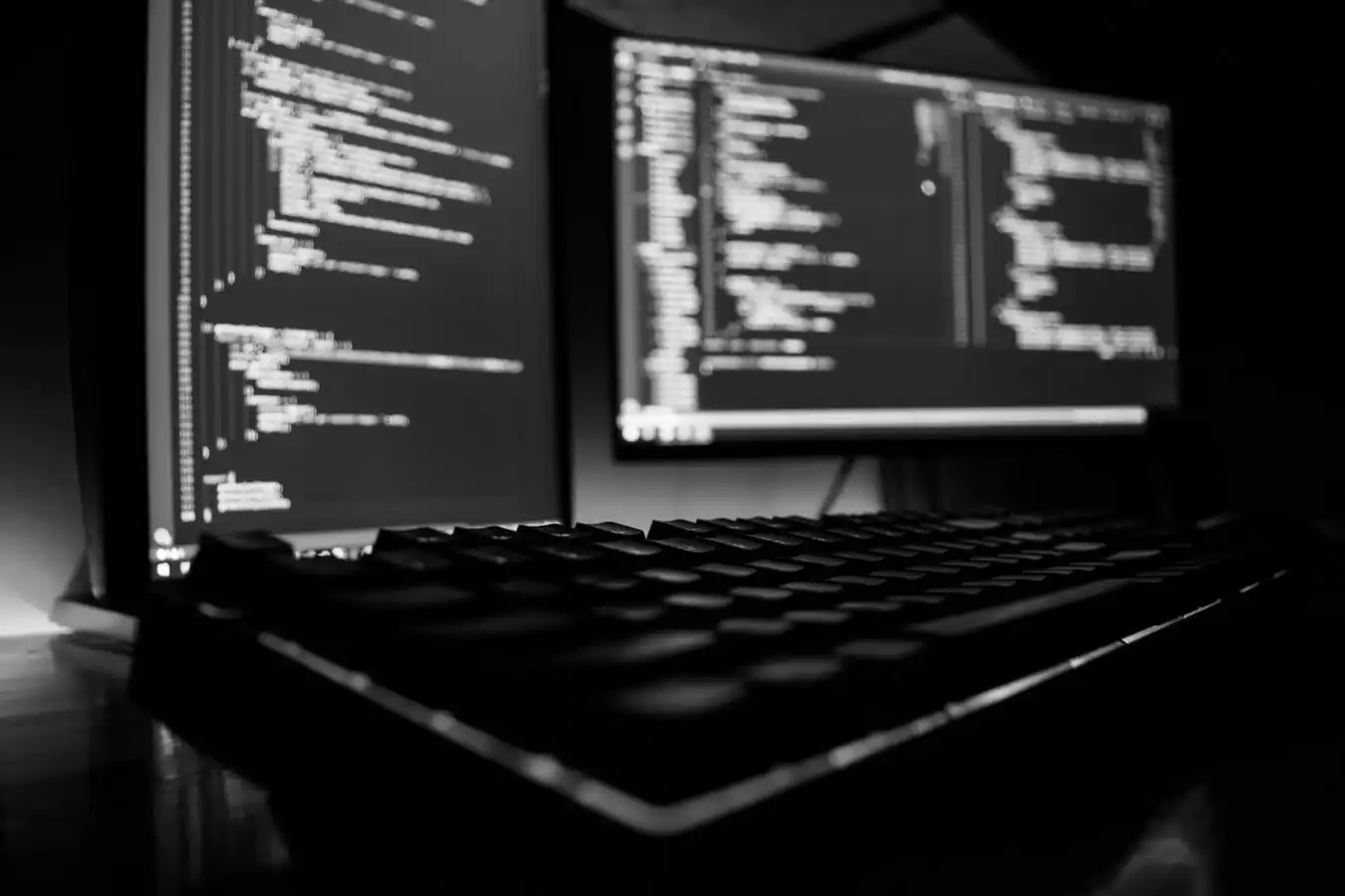background image of a computer monitor and keyboard